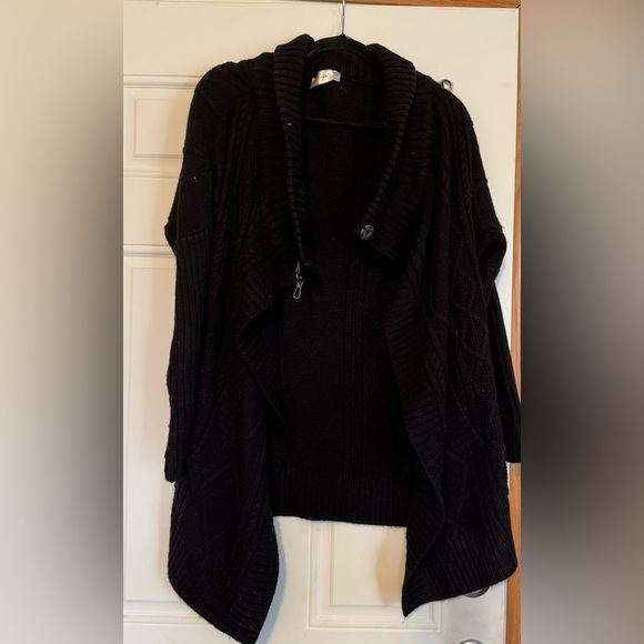 Cable knit cardigan. Size L. Color is black. Oversized. Snap and hook closure. - Picture 1 of 5